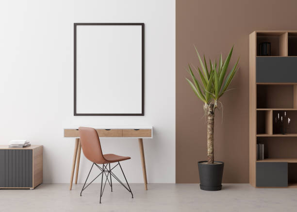 istock Empty vertical picture frame on white wall in modern room. Mock up interior in minimalist, contemporary style. Free, copy space for your picture, poster. Desk, chair, sideboard, plant. 3D rendering. 1387811248