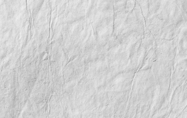 istock Paper texture. Paper texture for use as a background 1387820356
