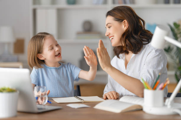 istock Girl doing homework or online education. 1387821102
