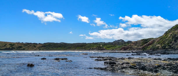 View of Philip island coast and beach from the sea stock photo