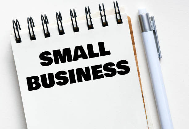 istock SMALL BUSINESS words in an office notebook. 1387824185