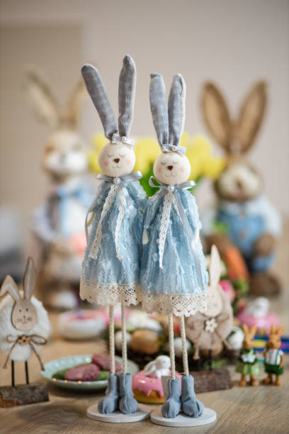 istock Table full of Easter bunnies and Easter decoration 1387825078