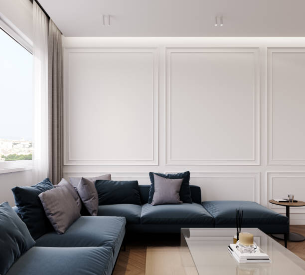 istock Modern interior design of living room with dark blue sofa and white empty wall background 1387828309