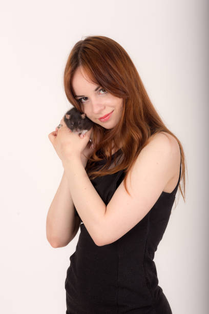 istock girl with a pet rat 1387828433