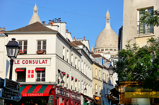 Exterior of the famous cafe Le Consulat at morning in Montmartre, Paris. The cafe was visited by plenty of the acclaimed artists, writers and painters that flocked to the area in the 19th century, include Picasso, Sisley, Van Gogh, Toulouse-Lautrec and Monet