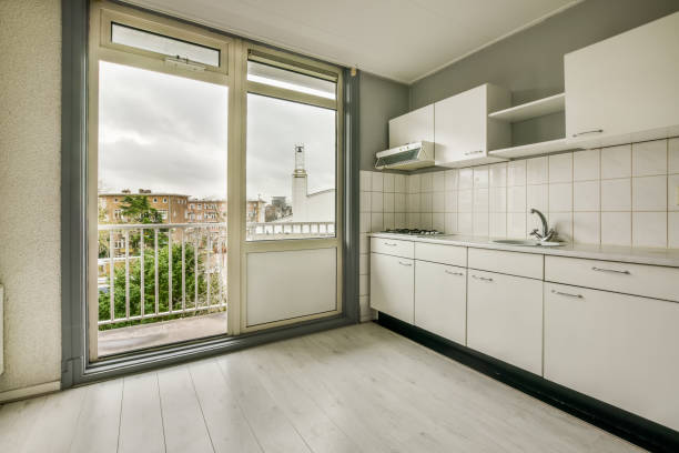 istock Corner kitchen and access to the balcony 1387831605