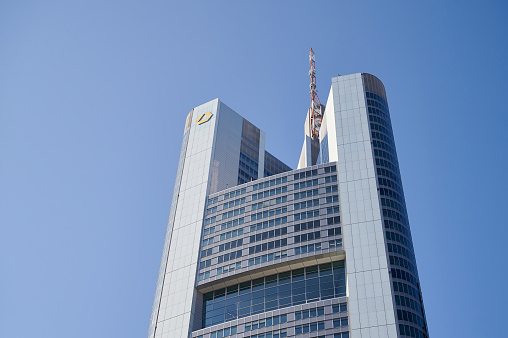 Looking directly up at the skyline of the financial district in central London