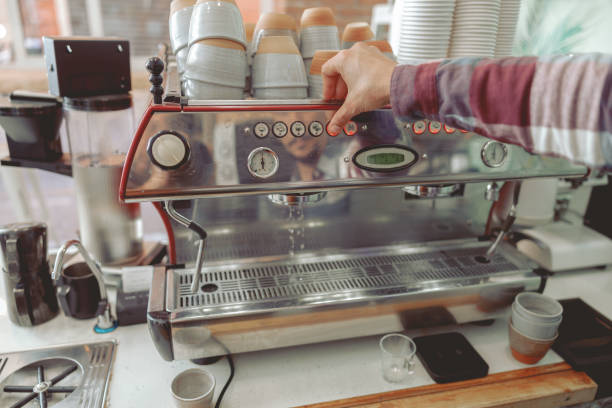 istock Process of cleaning coffee machine with two dispensing heads 1387837561