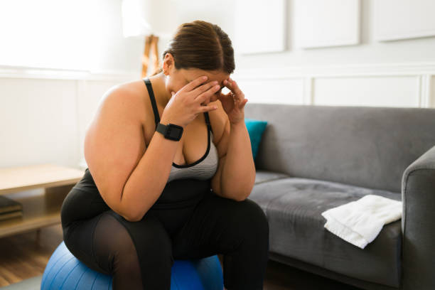 istock Depressed obese woman feeling depressed 1387838786