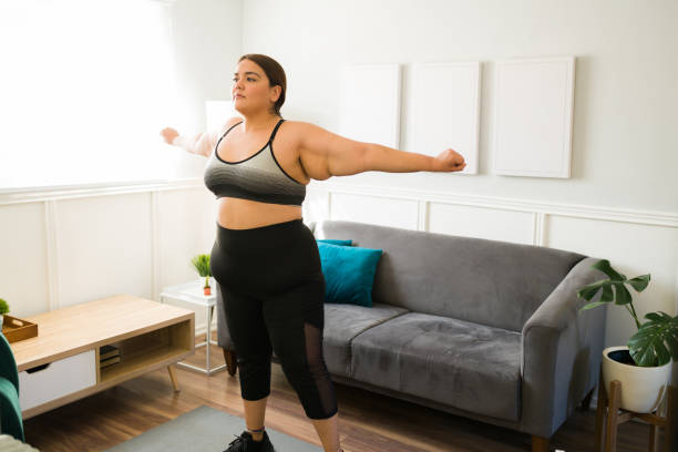 istock Active woman in her 20s exercising 1387838971