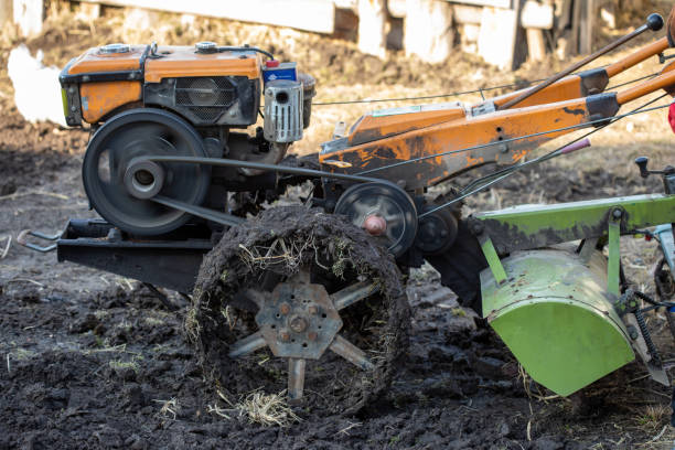 istock Garden tiller to work, walk-behind tractor 1387840040