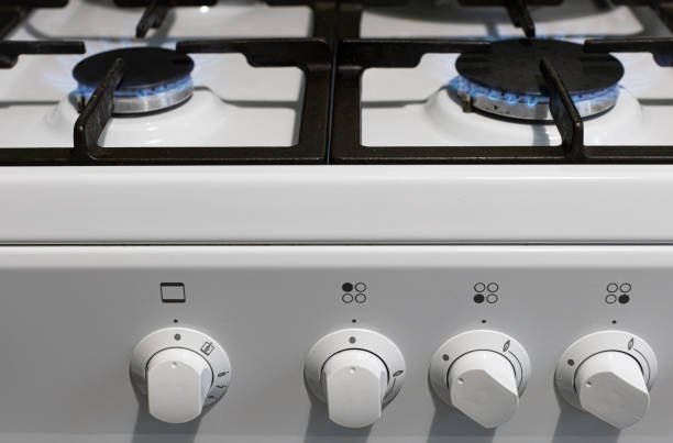 istock simple white gas stove with burning camphor 1387843651