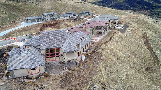 Home crumble under shifting land on a hillside Boise