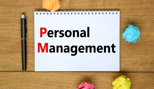 istock PM Personal management symbol. Concept words PM Personal management on white note. Metallic pen. Beautiful wooden background. Business and PM personal management concept. 1387847345