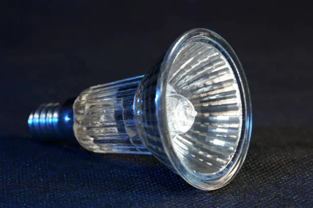 Photo of Lightbulb, halogen, incandescent lamp are reserve lamps for motor vehicles in 12 volt operation