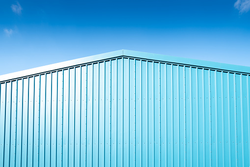 Abstract image of a newly built warehouse for a well known distribution company. Saturated colours help highlight the symmetrical structure.