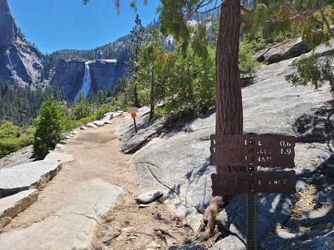 A trail sign looking back at Nevada Falls at the Clark Point junction