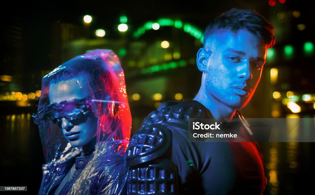 Metaverse man and woman in futuristic neon city Manga Style Stock Photo