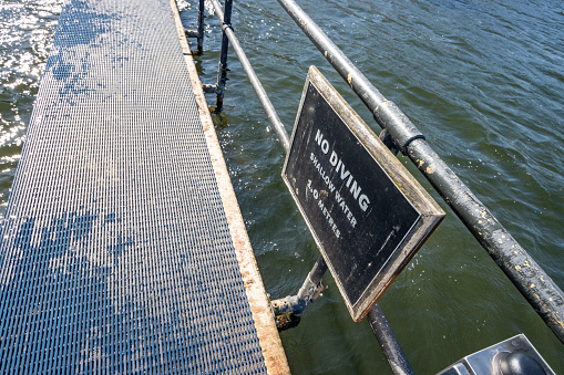 No Diving Sign at The Serpentine Lido at Hyde Park in City of Westminster, London