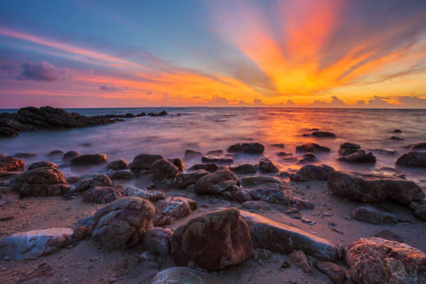 istock Colorful tropical beach at sunset 1387859323
