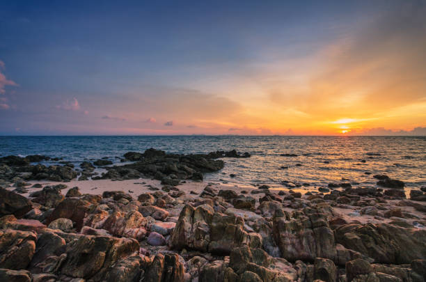 istock Colorful tropical beach at sunset 1387859329