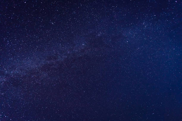 istock Fantastic starry sky over the head. Astrophotography. 1387860247