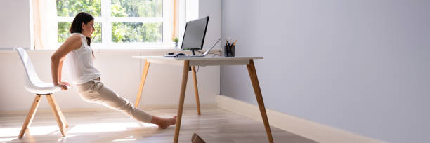 istock Businesswoman Doing Stretching Exercise 1387866252