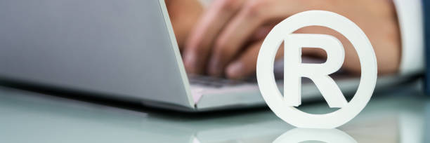 istock Trademark Sign Near Laptop 1387867426
