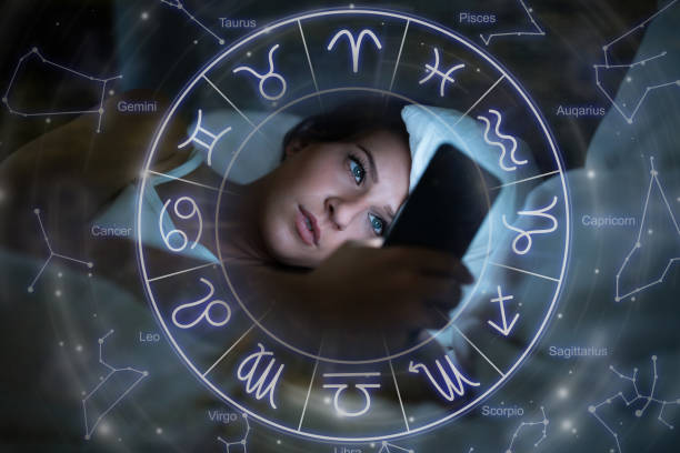 Woman In Bed With Mobile Phone