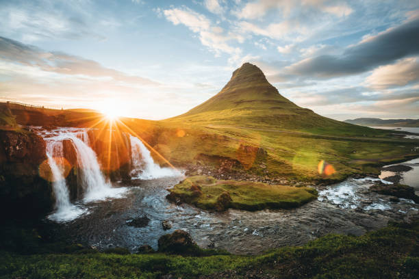 istock An epic sunset with Kirkjufellsfoss waterfall. Location Iceland, Europe. 1387869864