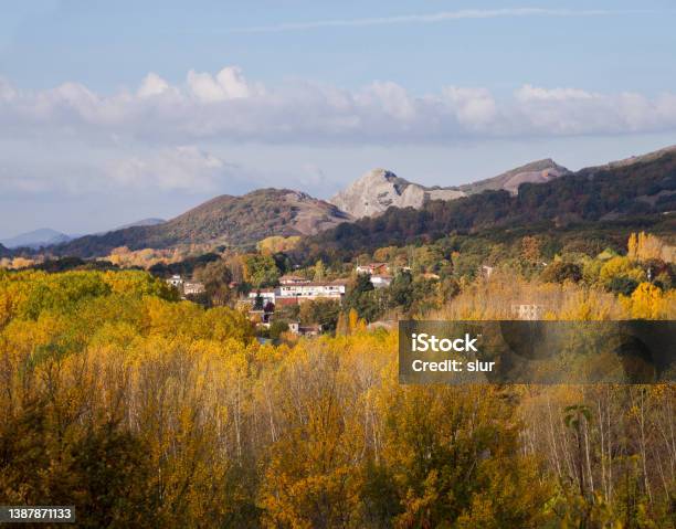 Mountain Village Surrounded By Autumnal Vegetation Mountain Village Surrounded By Autumn Vegetation Stock Photo - Download Image Now