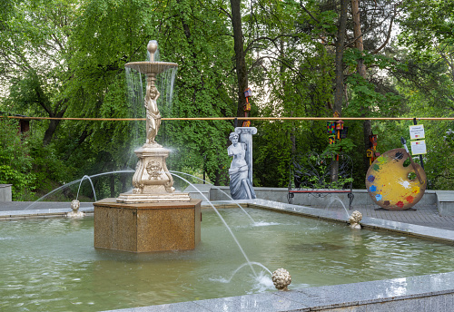 Evpatoria, Crimea, Russia - July 23, 2021: Fountain in the park of Heroes of Chernobyl on Lenin Avenue in the city of Evpatoria, Crimea