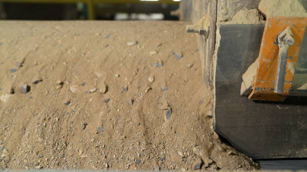 istock Conveyor additive for cement production. Raw material additive for building materials at the plant. Additives for the production of cement at the plant 1387873342