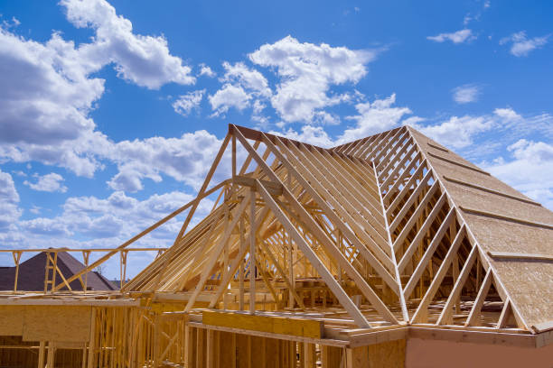 Aerial top view of wooden structure roof truss frame installation by under Aerial top view of wooden structure roof truss frame installation by under the construction house timber framed stock pictures, royalty-free photos & images