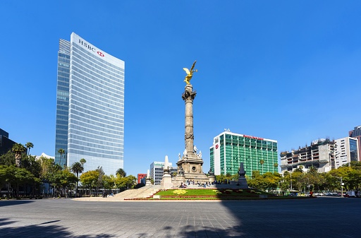 Mexico City, Mexico, December 14, 2016: View of the roundabout with the Monument to Independence, it is a victory column on the major thoroughfare of Paseo de la Reforma in downtown of Mexico City. The monument known as 