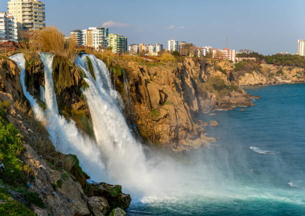Turkey - Antalya Duden Waterfall. The place where the waterfall spills into the sea, the Düdenba waterfall Turkey - Antalya Duden Waterfall. The place where the waterfall spills into the sea, the Düdenbas waterfall Duden stock pictures, royalty-free photos & images