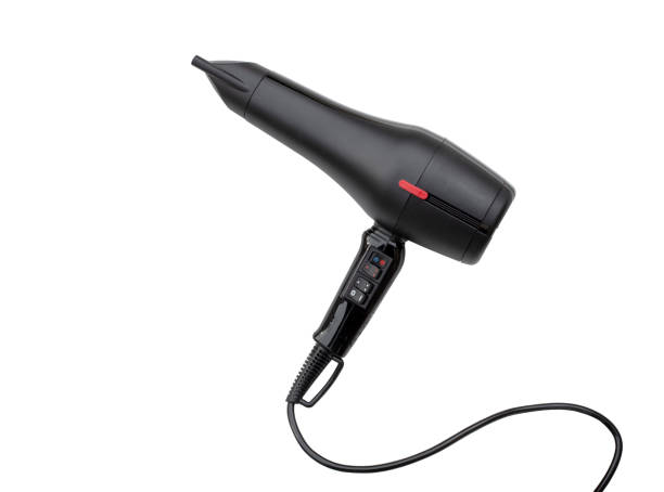 istock Black hair dryer isolated on white 1387884202