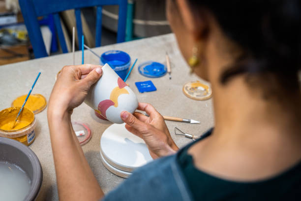 istock Pottery. Painting pottery. 1387894523