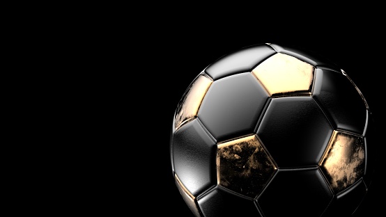 Orange and black soccer metal ball isolated on black background. Football 3d render illustration.