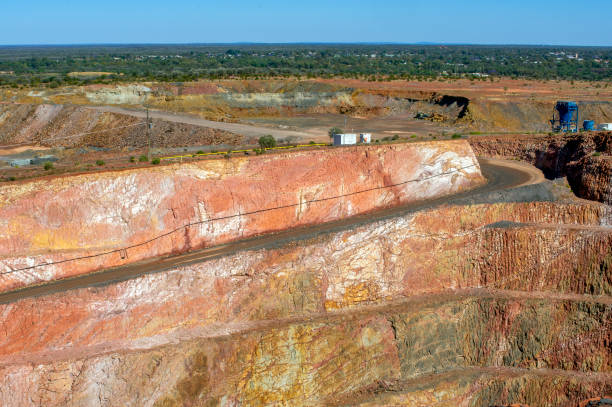 istock View across open cut mine with clear blue sky, Cobar, NSW, Australia 1387903154