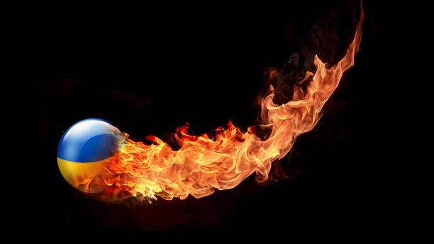 Ukrainian Flag on ball meteorite with flames