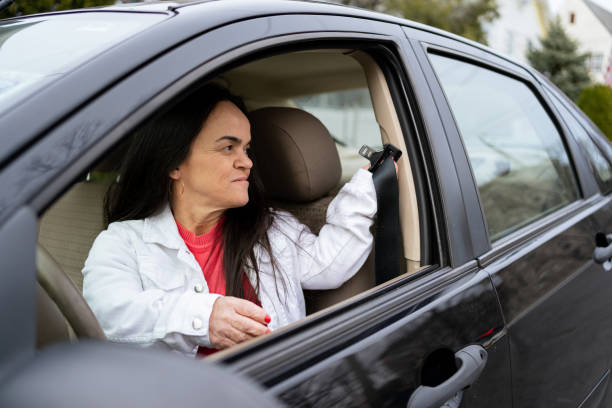 istock Confident latin woman with dwarfism driving 1387910729