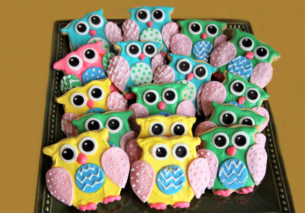 istock Colorful owl cookies on a tray 1387911629