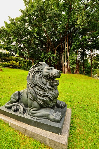 Bavaria, Germany - June 28, 2022: Black lion sculpture in Linderhof Palace park