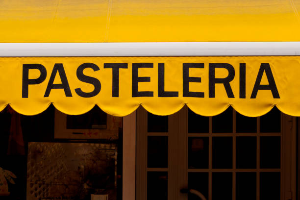 istock Awning with cake shop commercial sign. 1387931279