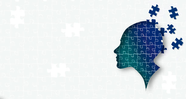 istock Cutout silhouette of a human head containing brain made from puzzle pieces, revealing thinking concept 1387932222
