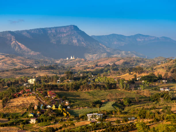 istock Wat Phra That Pha Son Kaew  from a Distance , Next to  a Mountain Range 1387933117