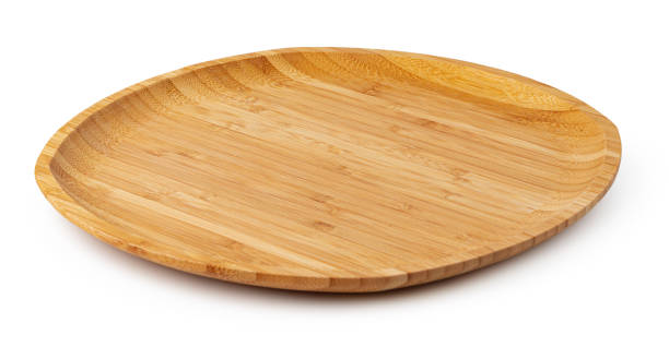 istock Wooden plate isolated on white background, close up 1387934120
