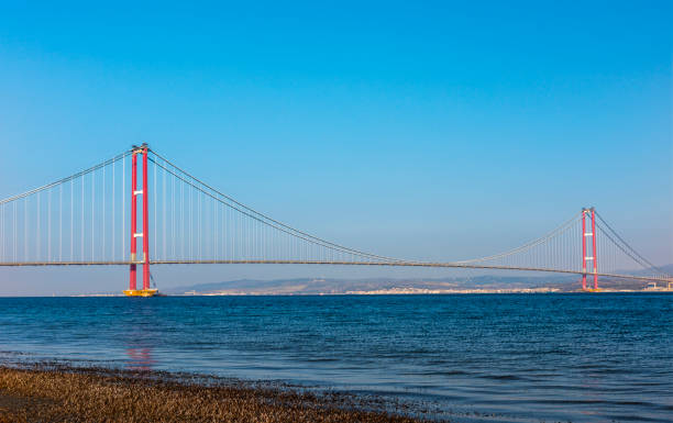 1915 Canakkale Bridge in Canakkale, Turkey. World's longest suspension bridge opened in Turkey. Turkish: 1915 Canakkale Koprusu. Bridge connect the Lapseki to the Gelibolu. 1915 Canakkale Bridge in Canakkale, Turkey. World's longest suspension bridge opened in Turkey. Turkish: 1915 Canakkale Koprusu. Bridge connect the Lapseki to the Gelibolu. dardanelles stock pictures, royalty-free photos & images