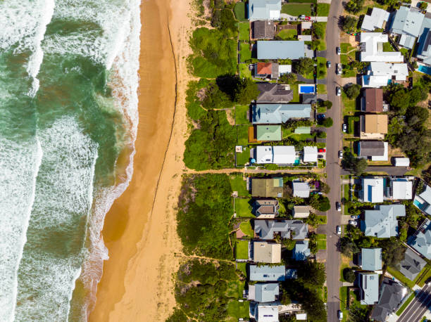 istock Coastal Suburb overhead perspective roof tops 1387943811